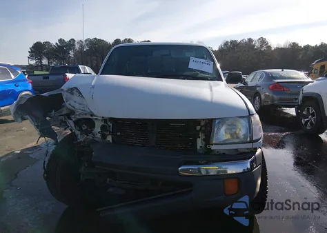 1999 Toyota Tacoma из США, поврежденный, VIN 4TAWN72N3XZ506002